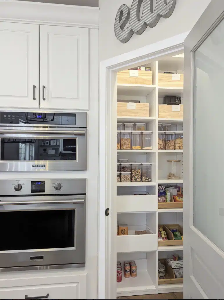 Beautifully organized walk-in pantry by SimpliMind Organizing in Dublin, Ohio