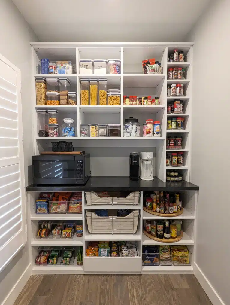 Organized pantry with functional zones by SimpliMind Organizing